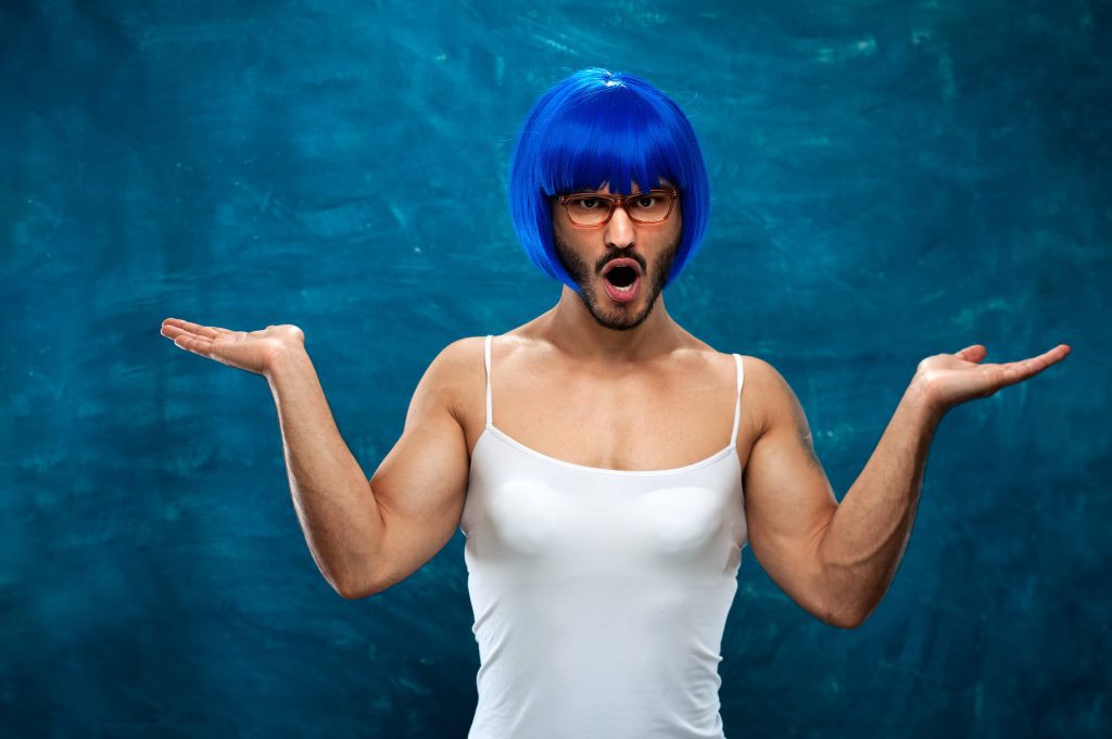 male cross dresser with a blue wig