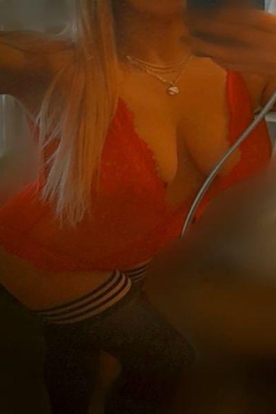 selfie of Newcastle escort in red lingerie