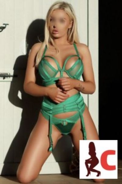 blonde Derry escort in green lingerie