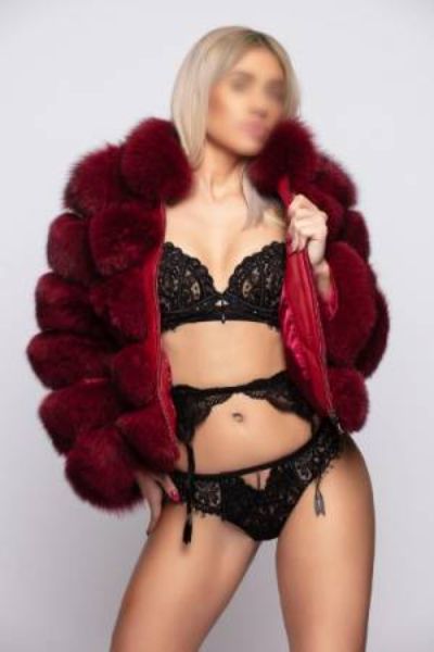 Robin Central London Escort poses sexy in fur coat