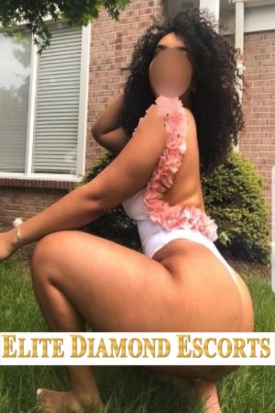 sexy ebony Nottingham escort in floral bodice