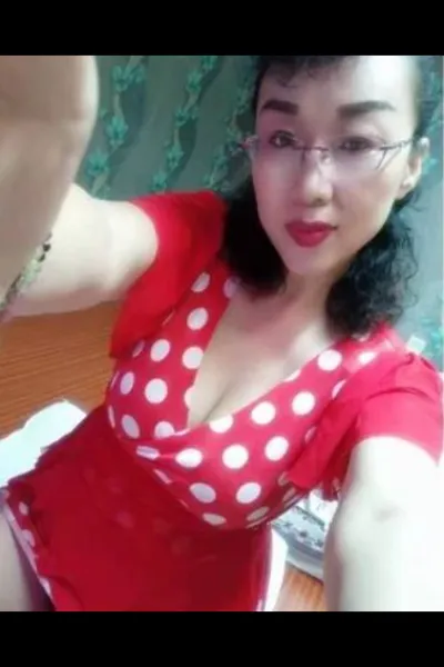 Asian Erotic Aberdeen Masseuse in red and white dot top