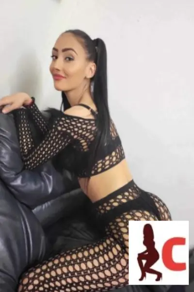 young Dublin escort in fishnet outfit