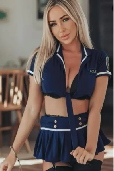 Blonde escort in sexy police outfit